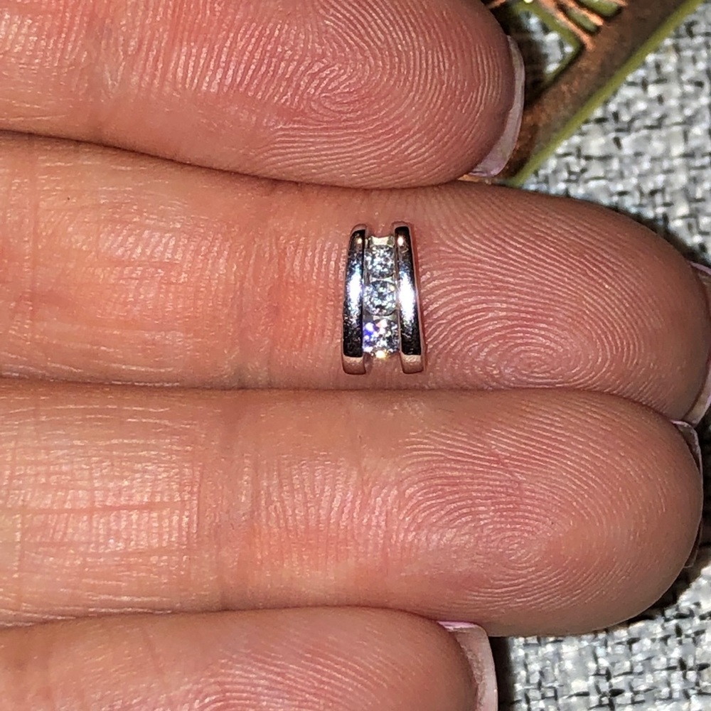 10k White gold and Diamond- pendant only.